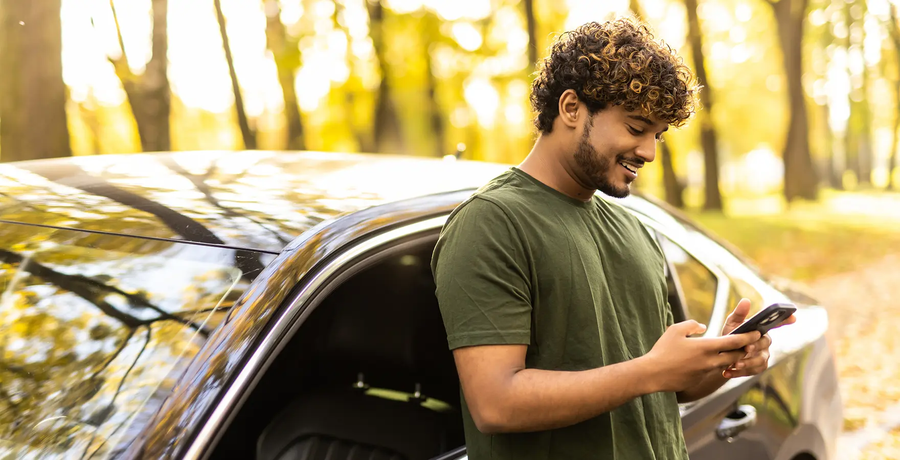 Man standing by car