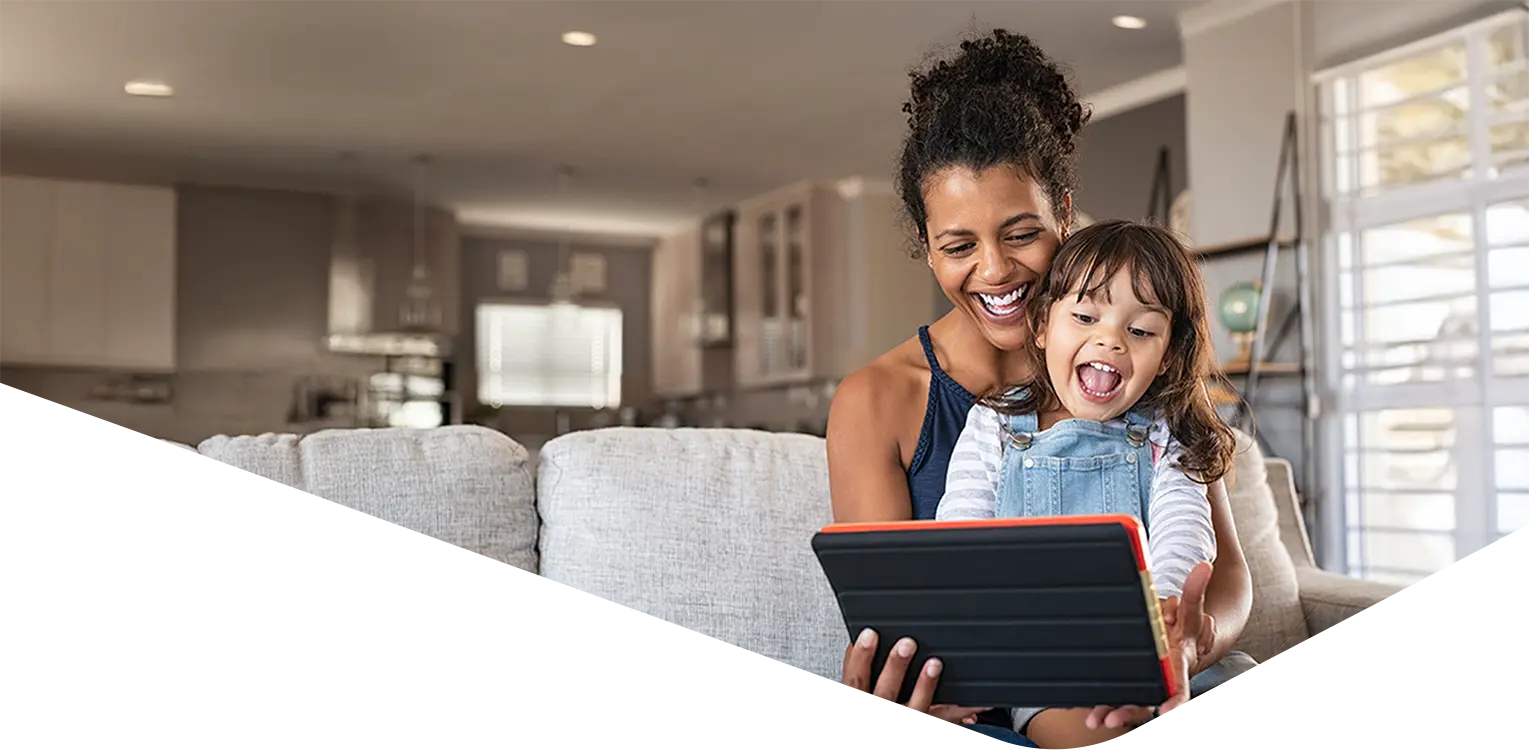 Woman and child looking at a mobile device