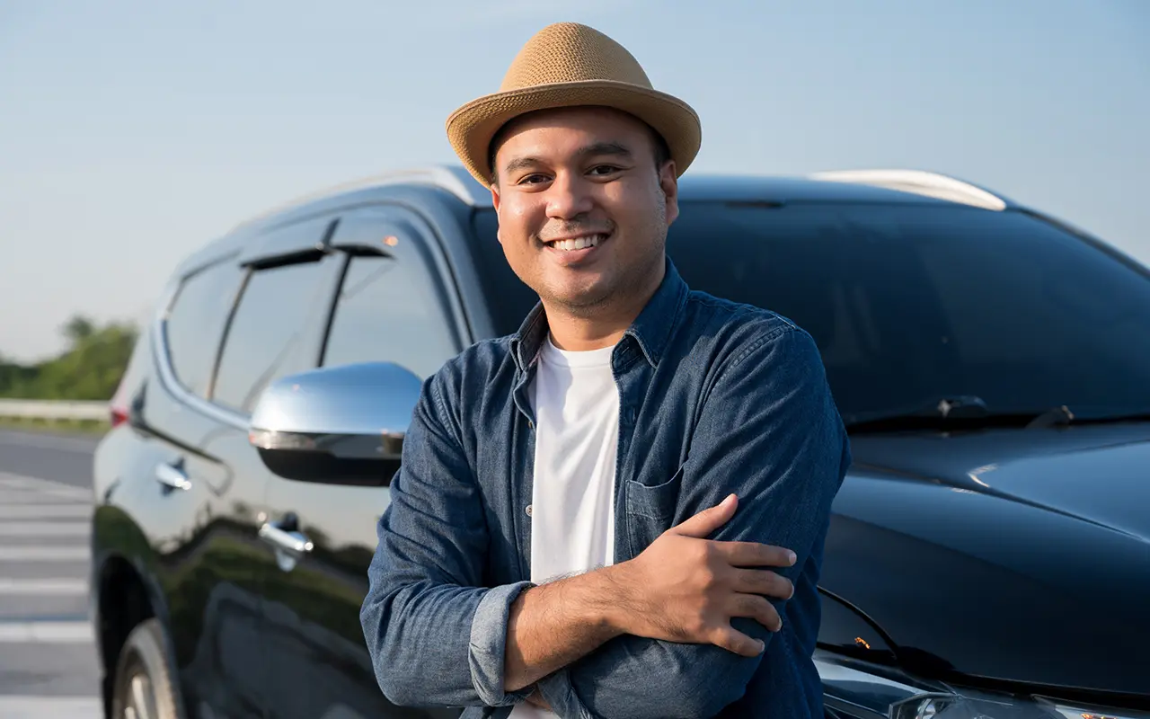 Man leaning against car